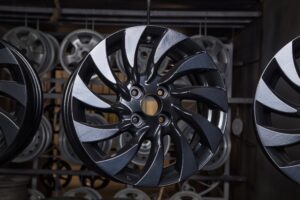 Metallic Car Wheel After Coating It with a Smooth Layer of Powder at Rim Doctor in Baltimore, MD.